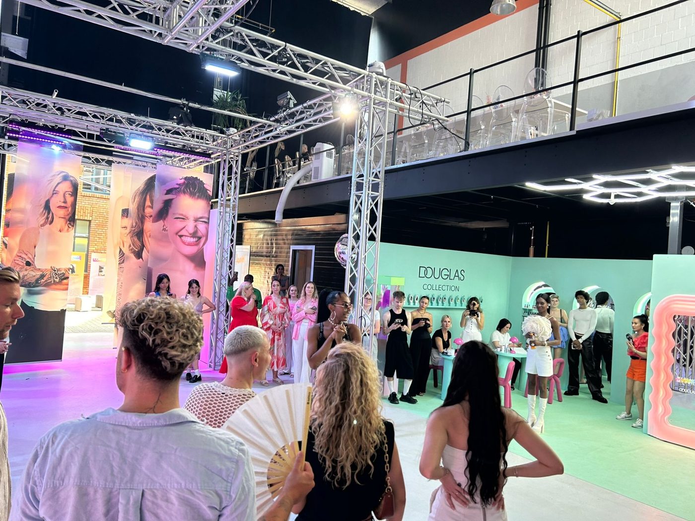 Brand staging in the studio across two levels with an audience